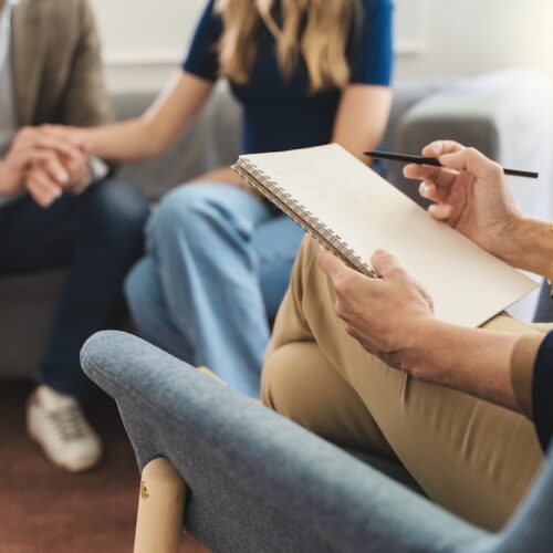 A couple participates in couples therapy in a rehab program.